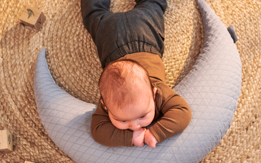 When can babies sleep on their stomach?